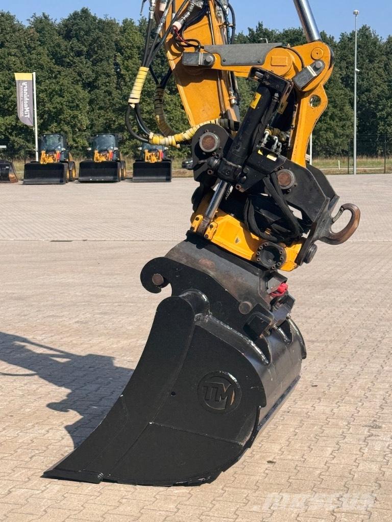 CAT M316F حفارات بعجل