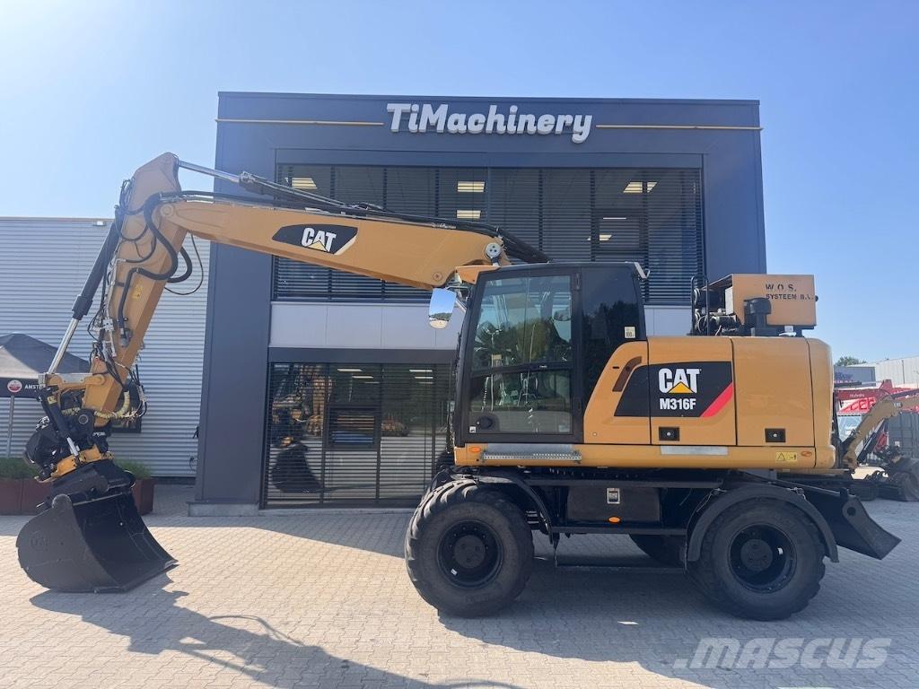 CAT M316F حفارات بعجل