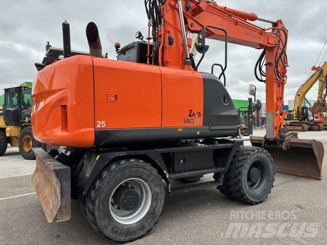 Hitachi ZX 140 W-5 حفارات بعجل
