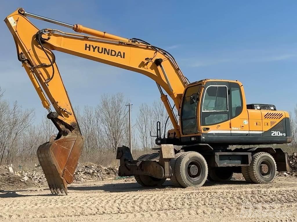 Hyundai R210W-9 حفارات بعجل