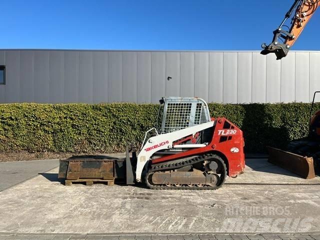 Takeuchi TL 230 لوادر انزلاقية التوجيه