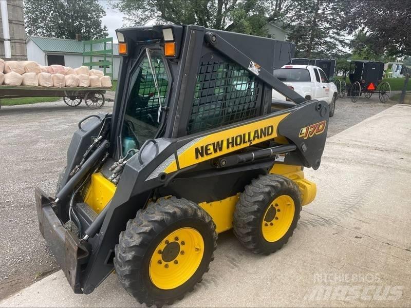 New Holland L 170 لوادر انزلاقية التوجيه