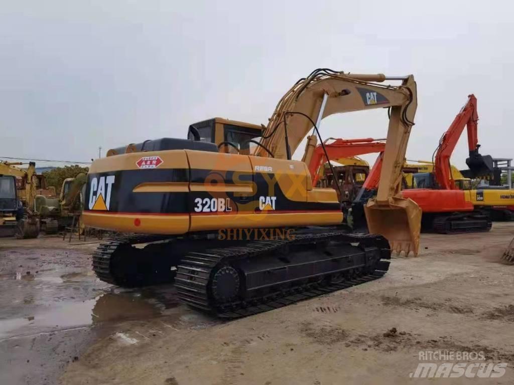 CAT 320 B حفارات زحافة