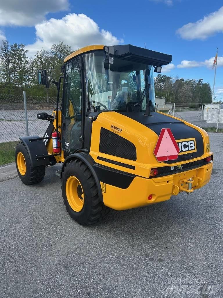 JCB 407 لوادر بعجل