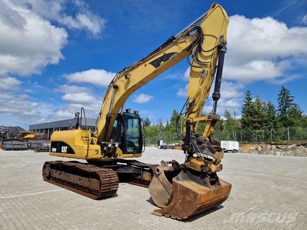 CAT 319D حفارات زحافة
