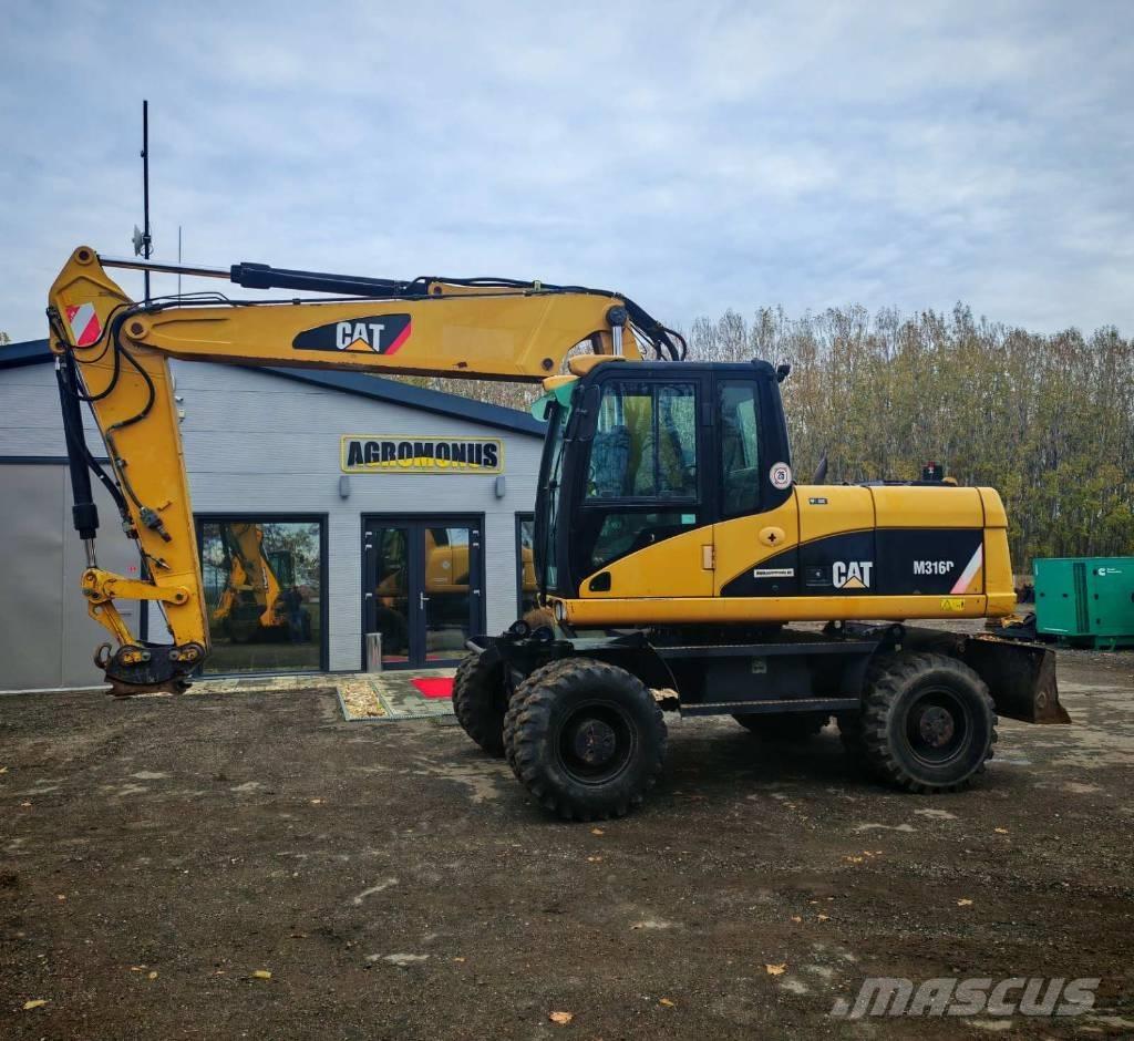CAT M 316 D حفارات بعجل