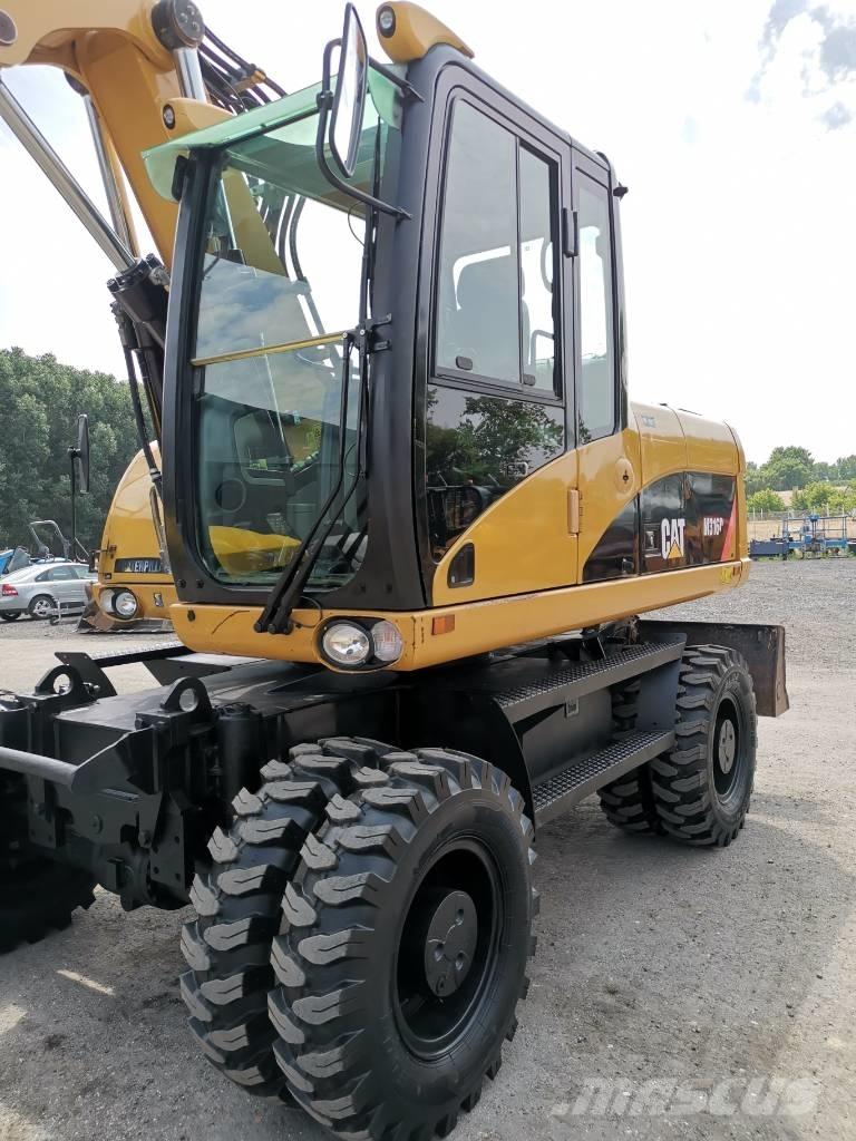CAT M 316 D حفارات بعجل