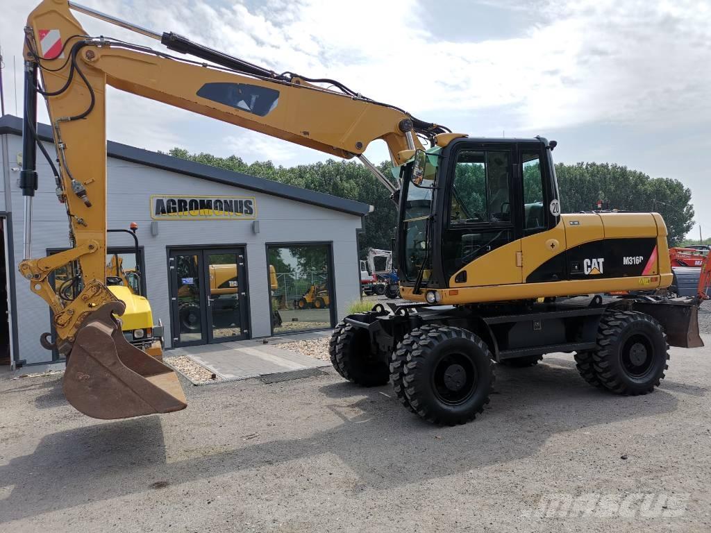 CAT M 316 D حفارات بعجل