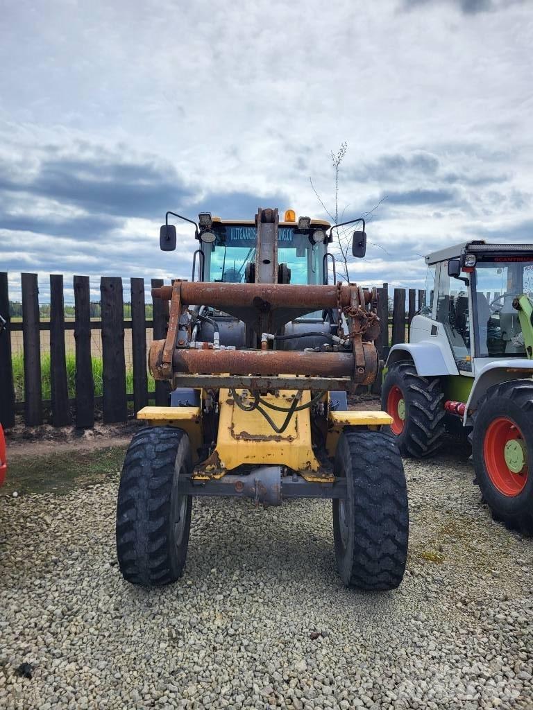 Volvo L 32 Z لوادر بعجل