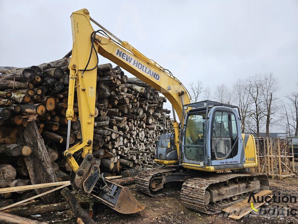 New Holland E 145 حفارات زحافة