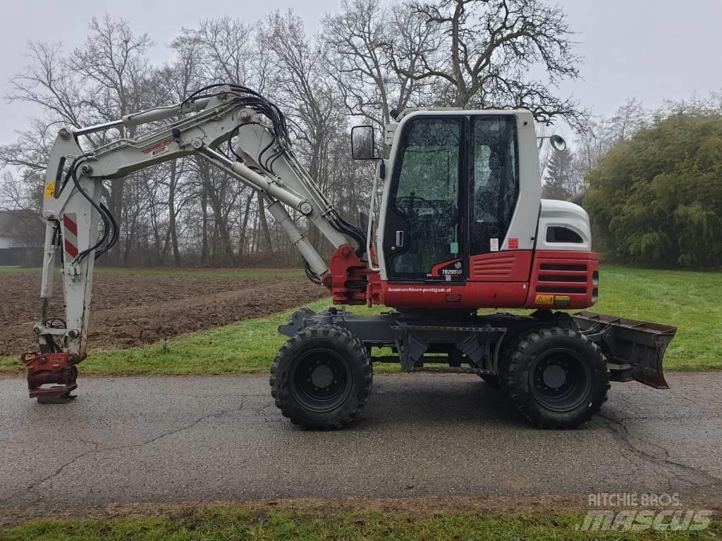 Takeuchi TB 295 W حفارات بعجل