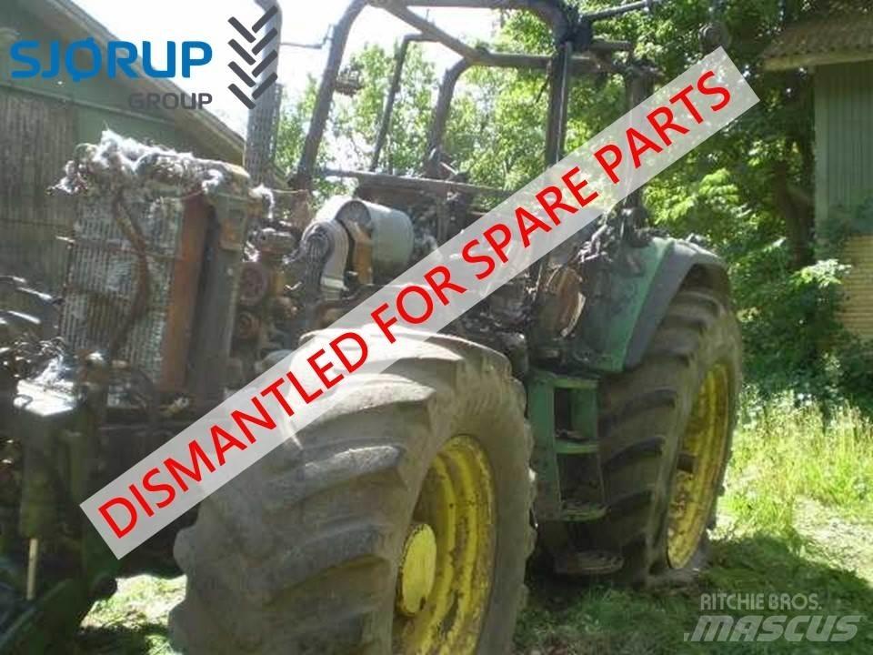 John Deere 7710 الجرارات