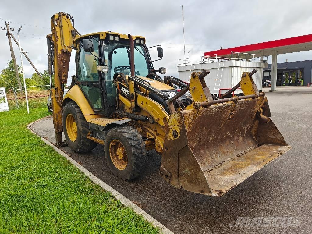 CAT 428 F لوادر ذات جرافات عكسية