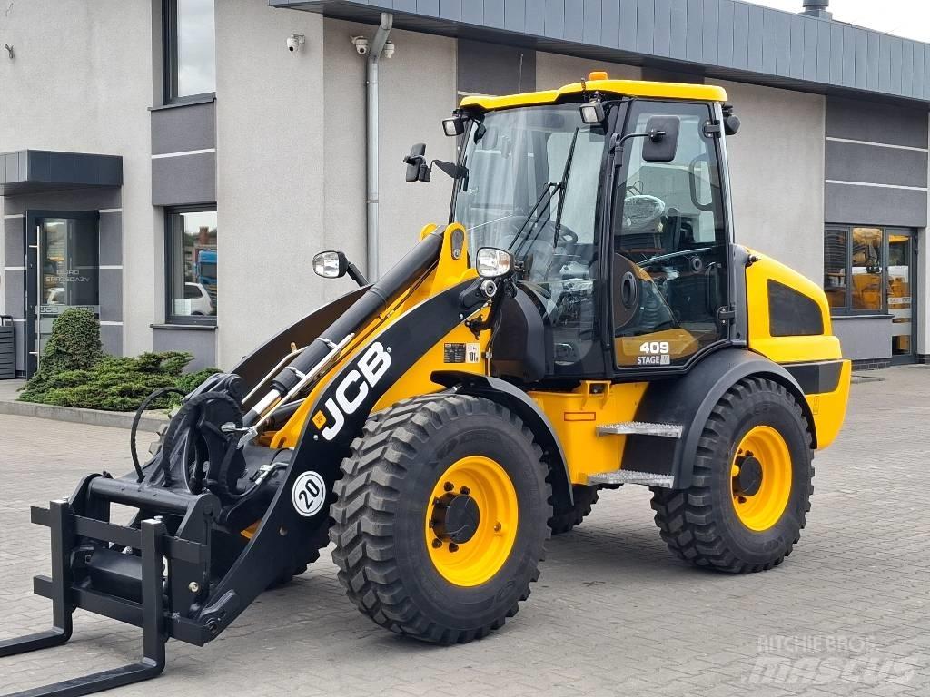 JCB 409 لوادر بعجل