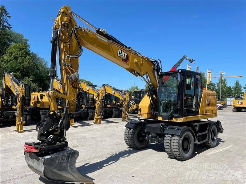 CAT M314 حفارات بعجل