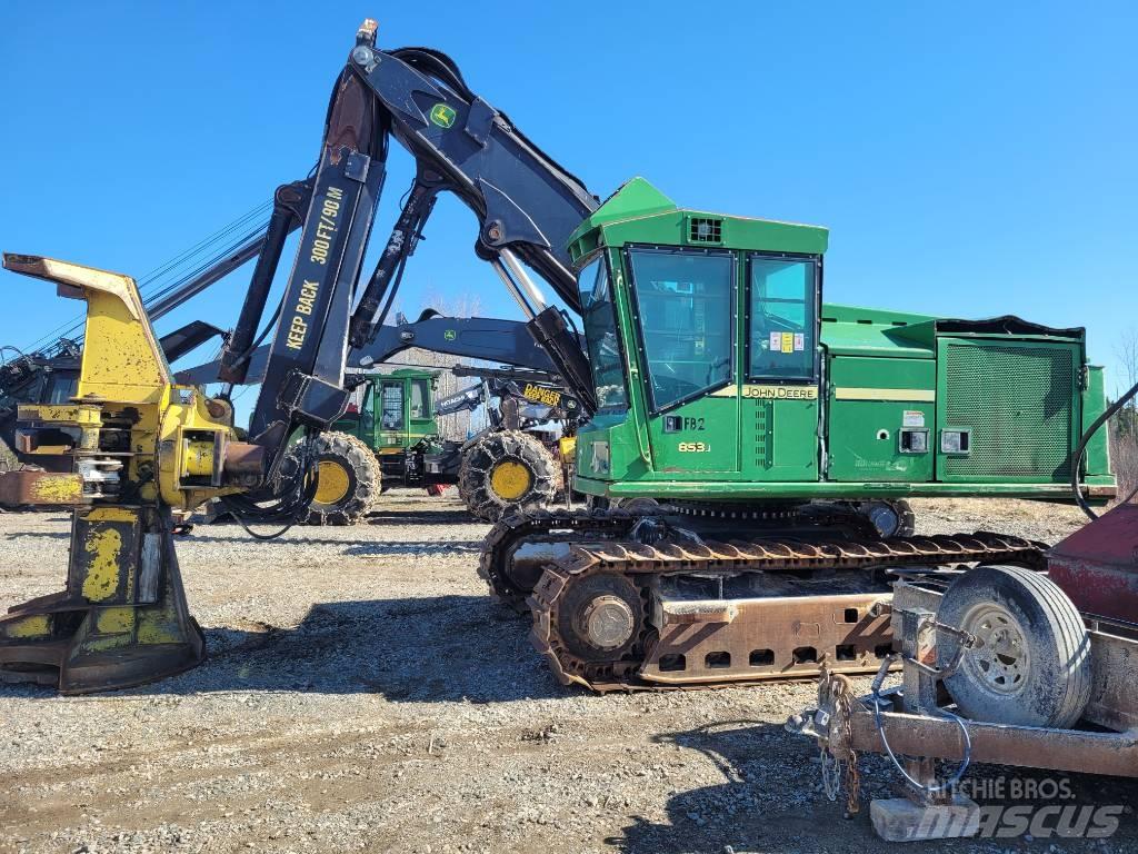 John Deere 853 قاطعات وجامعات الأشجار