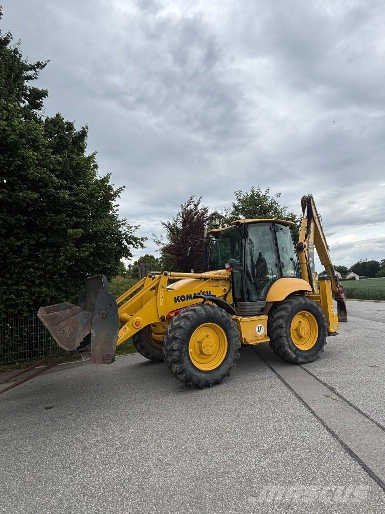 Komatsu WB 97 S لوادر ذات جرافات عكسية