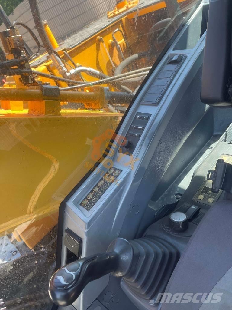 Hyundai 210W-9 حفارات بعجل