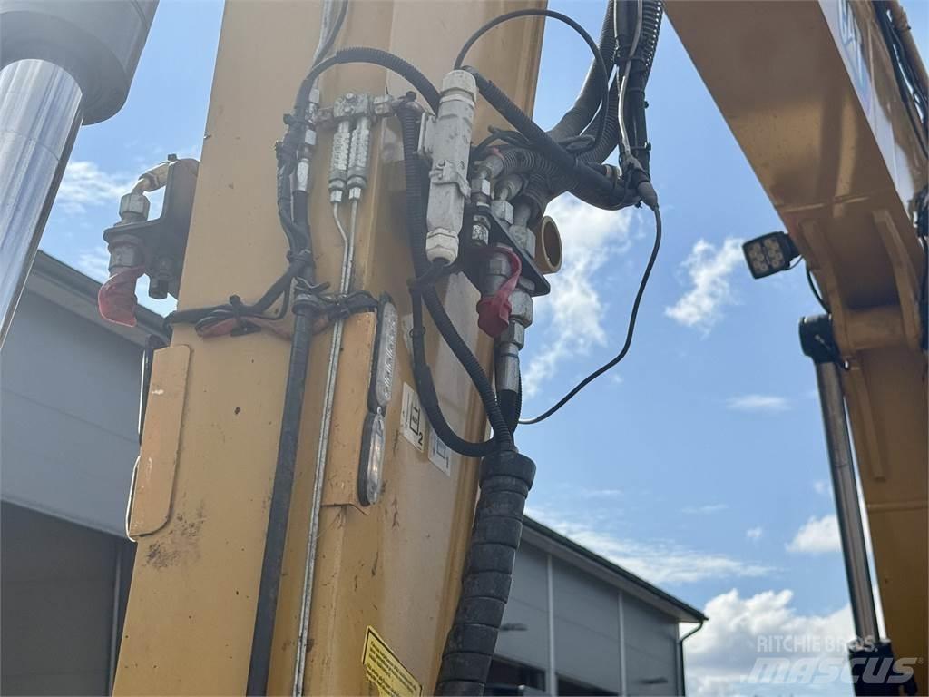CAT 310 حفارات وسط 7 طن - 12 طن