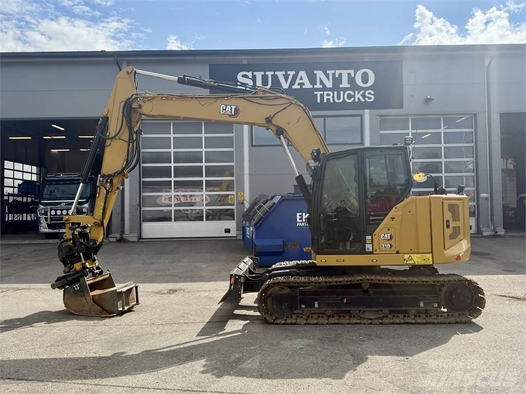 CAT 310 حفارات وسط 7 طن - 12 طن