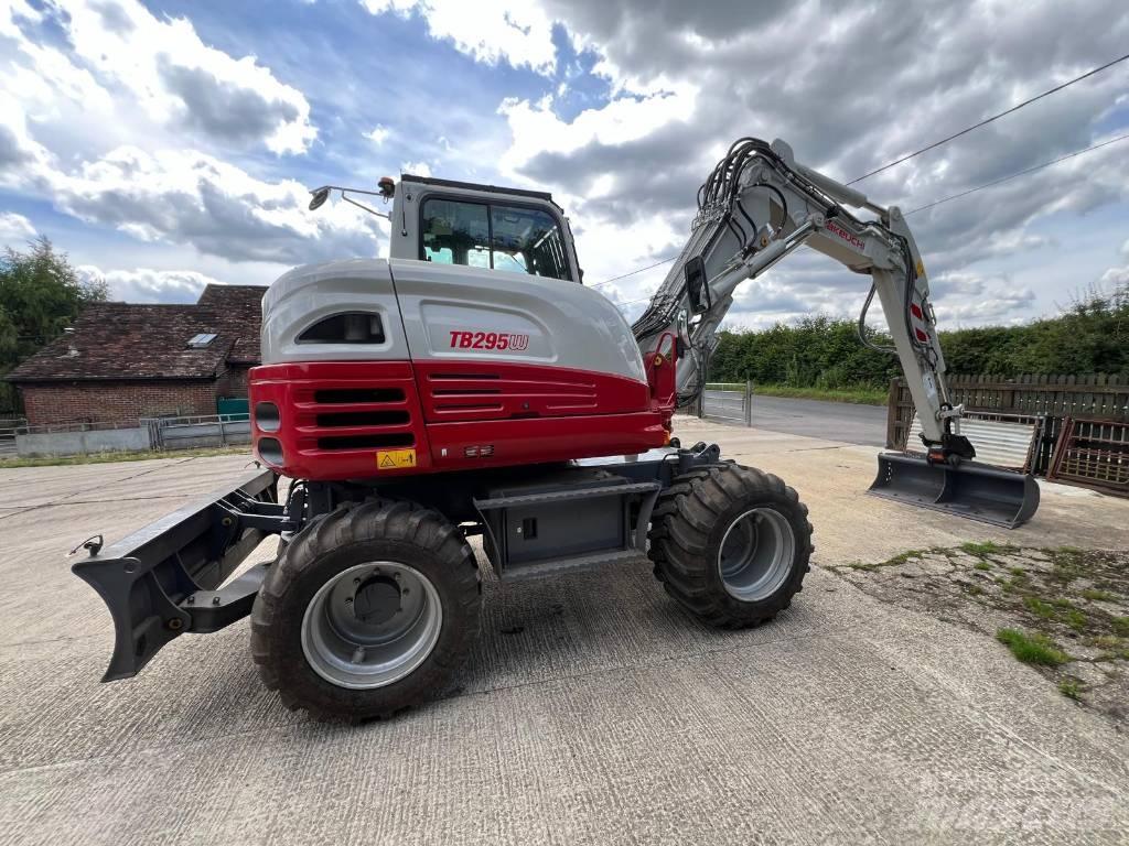 Takeuchi 295w حفارات بعجل