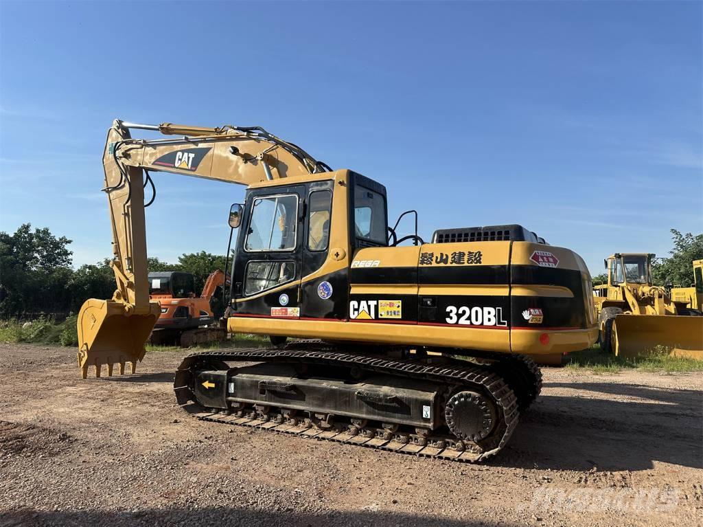 CAT 320BL حفارات زحافة