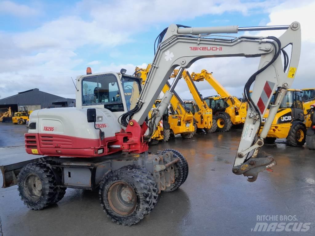 Takeuchi TB 295 W حفارات بعجل