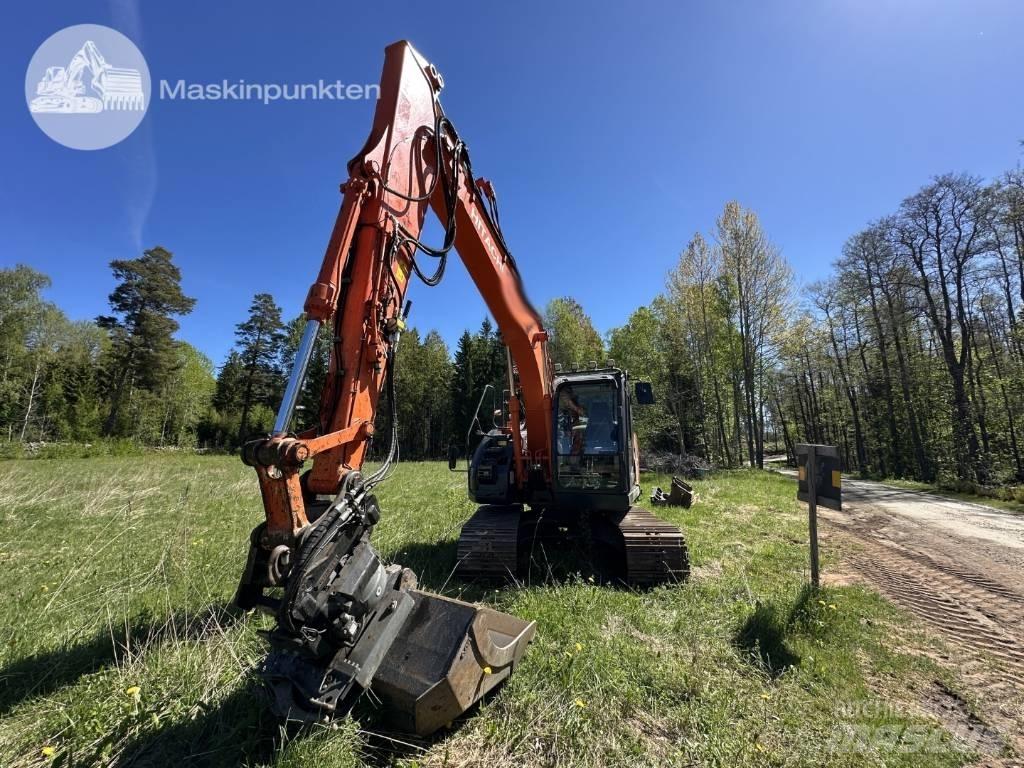 Hitachi ZX 135 US-6 حفارات زحافة