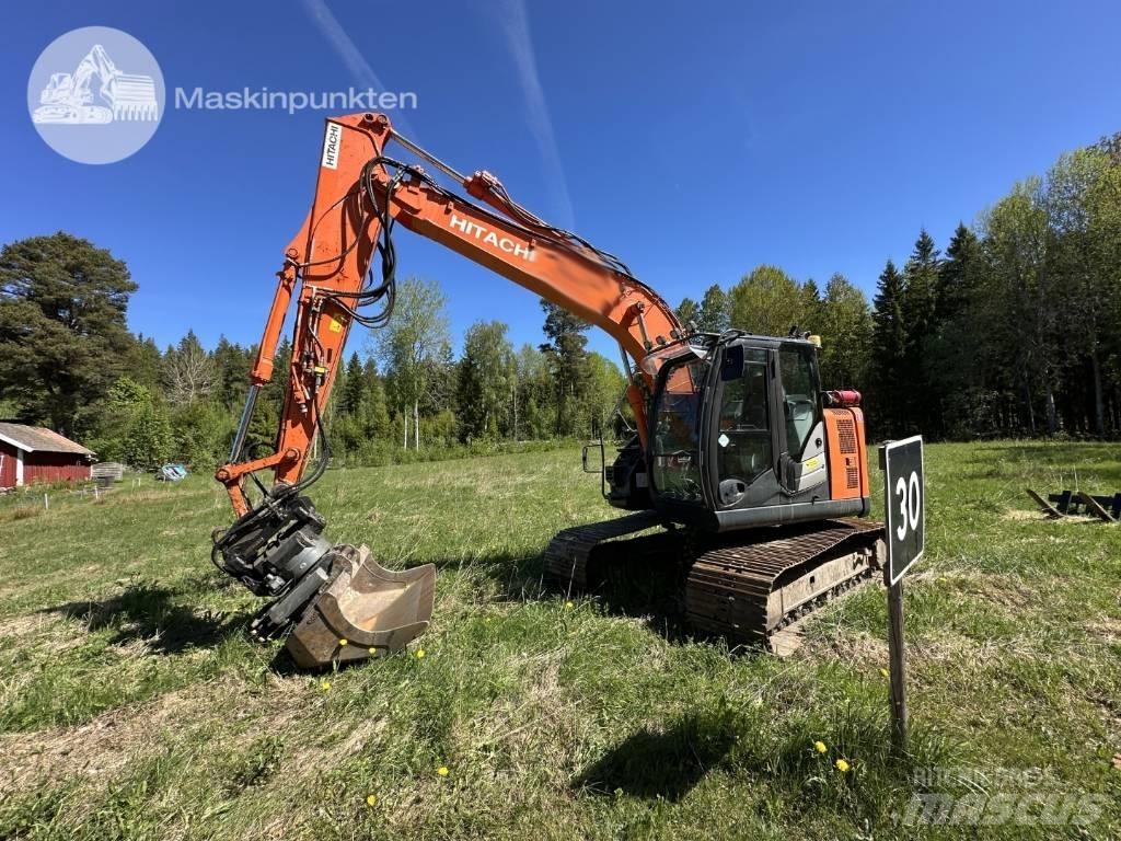 Hitachi ZX 135 US-6 حفارات زحافة