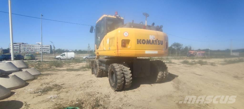 Komatsu PW 140-7 حفارات بعجل