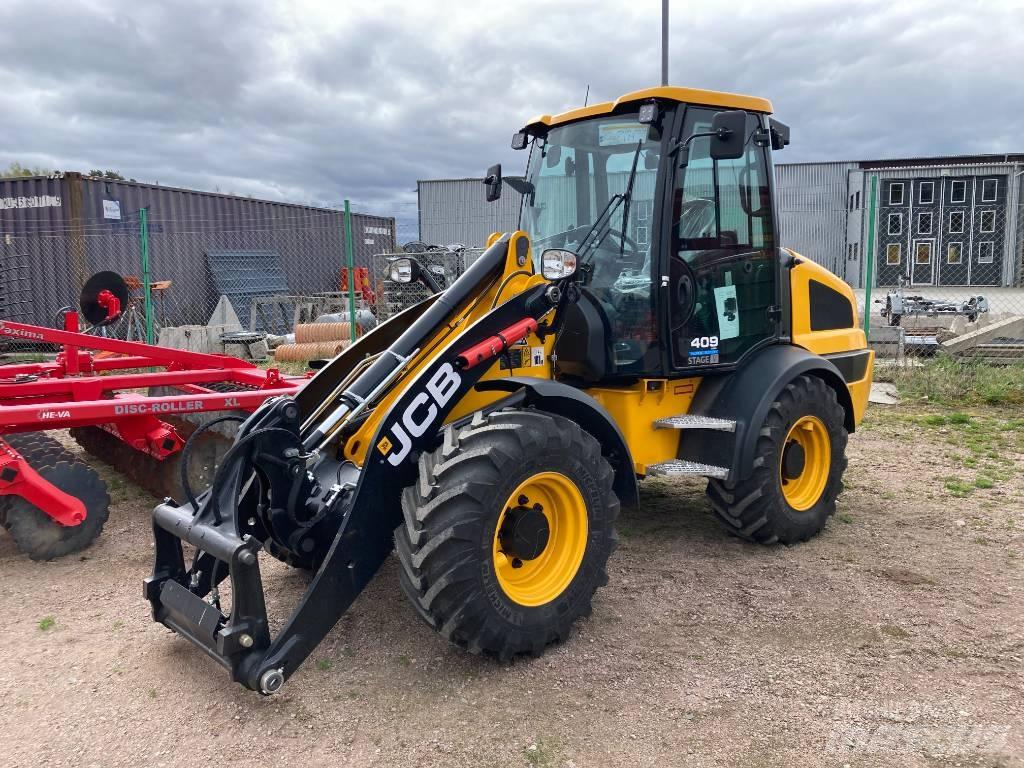 JCB 409 لوادر بعجل