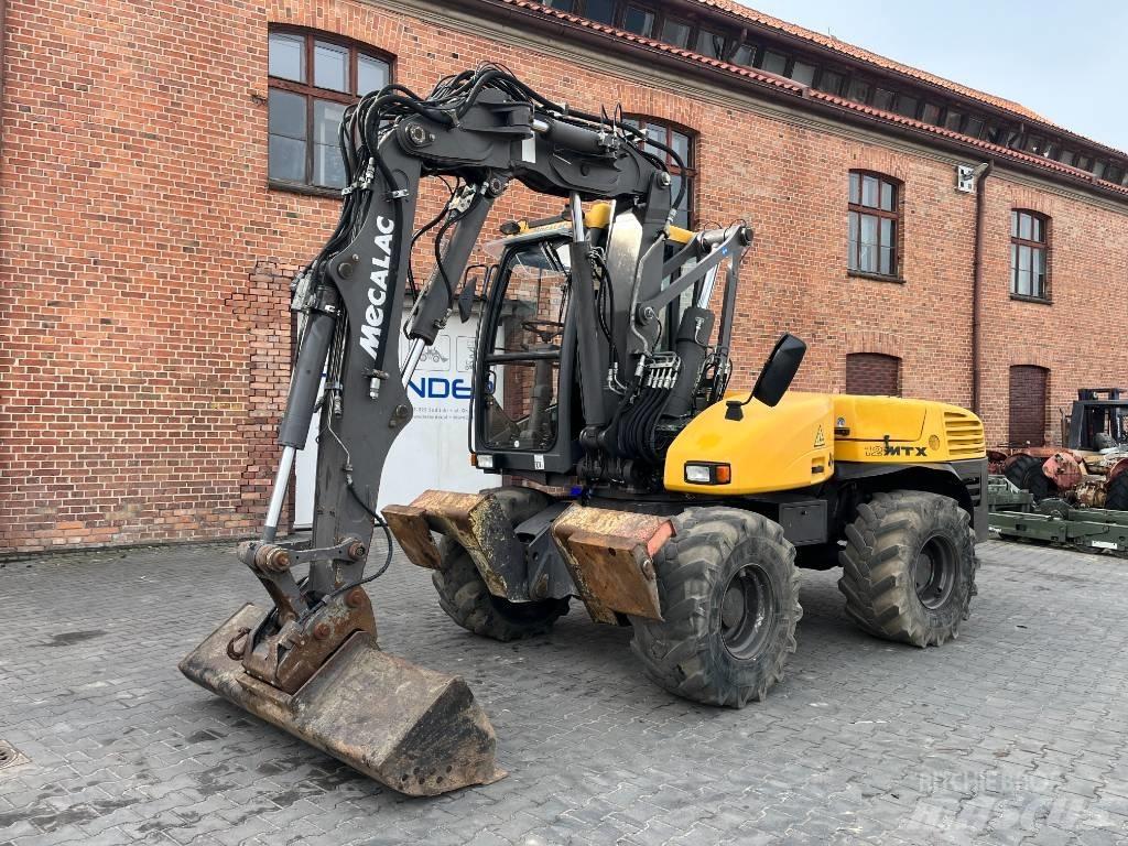 Mecalac 12 M TX حفارات بعجل