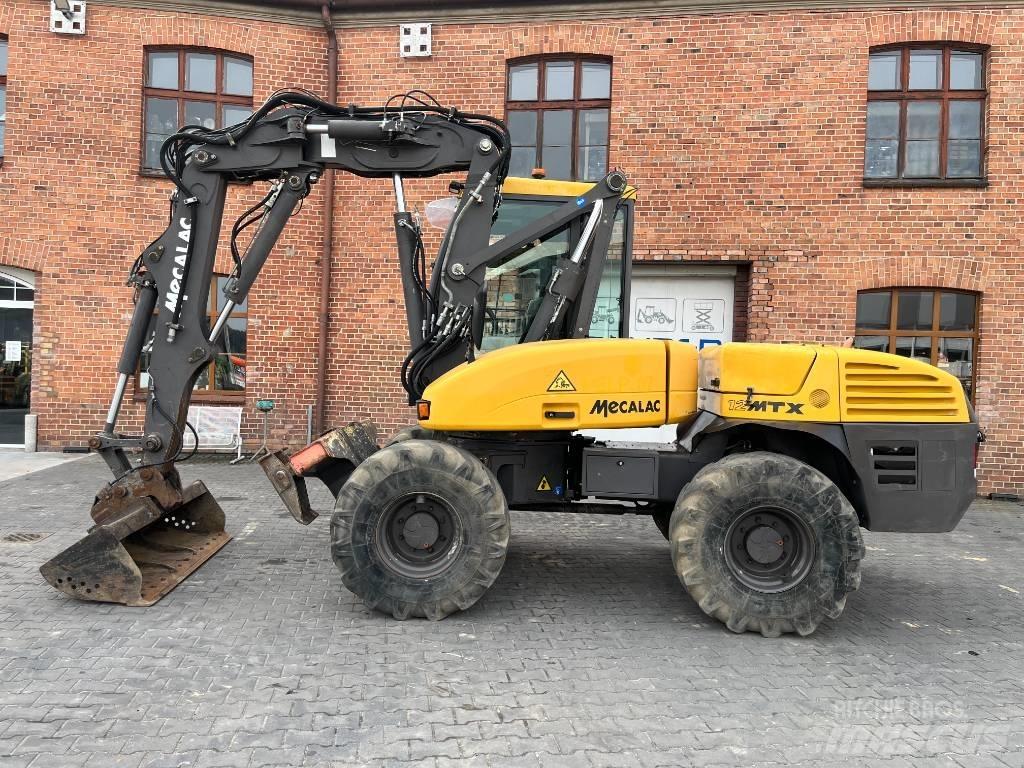 Mecalac 12 M TX حفارات بعجل