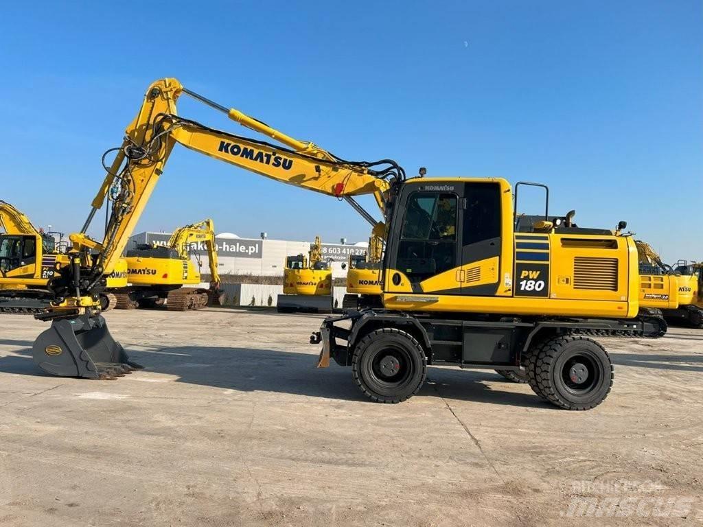 Komatsu PW 180-11 حفارات بعجل