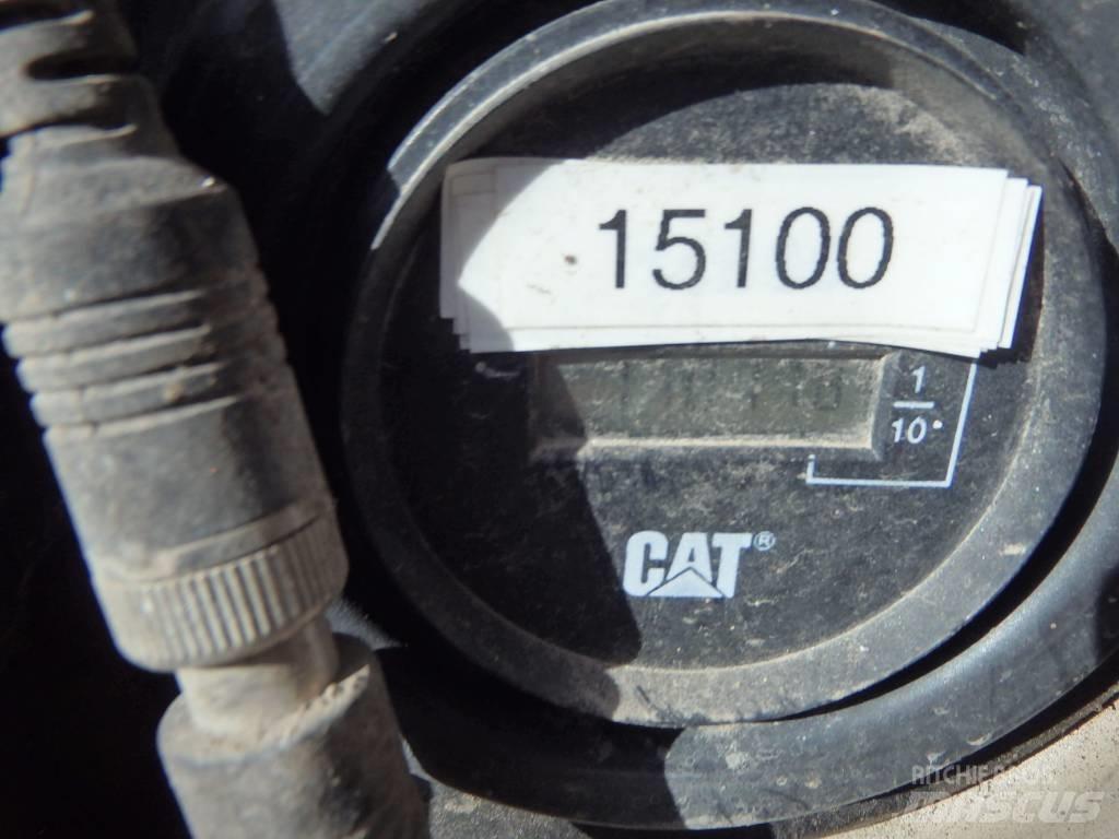 CAT M 313 C 4x4 حفارات بعجل