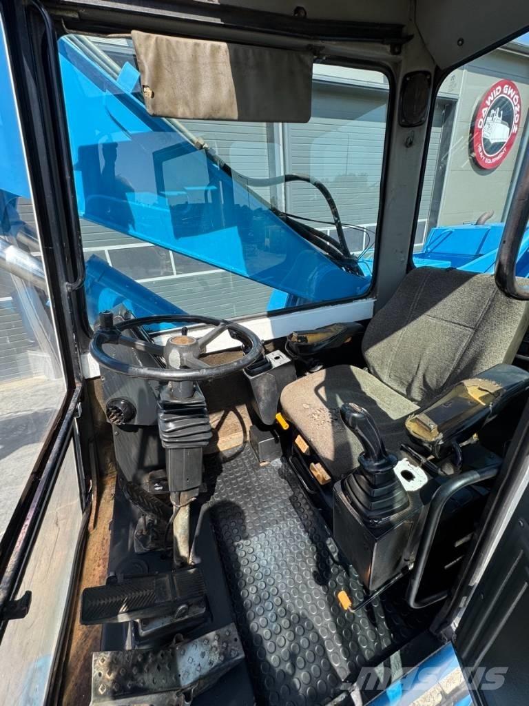 Fuchs MHL 331 مناولات المخلفات / مناولات صناعية