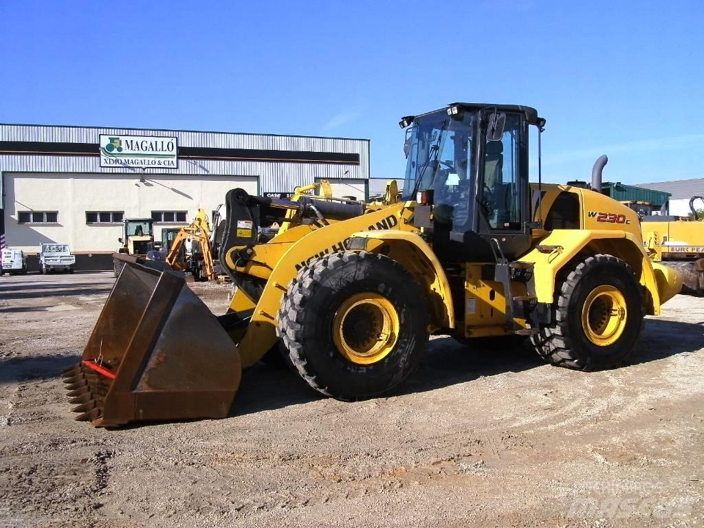 New Holland W 230 C لوادر بعجل