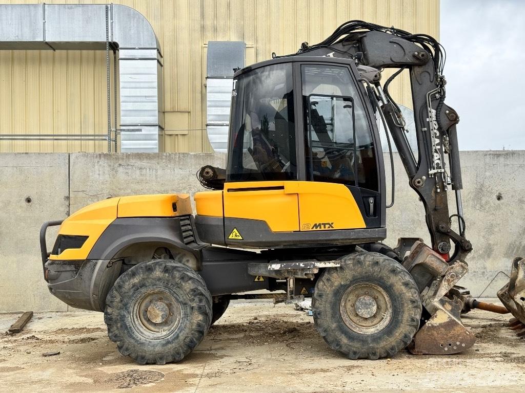 Mecalac 12 MTX حفارات بعجل
