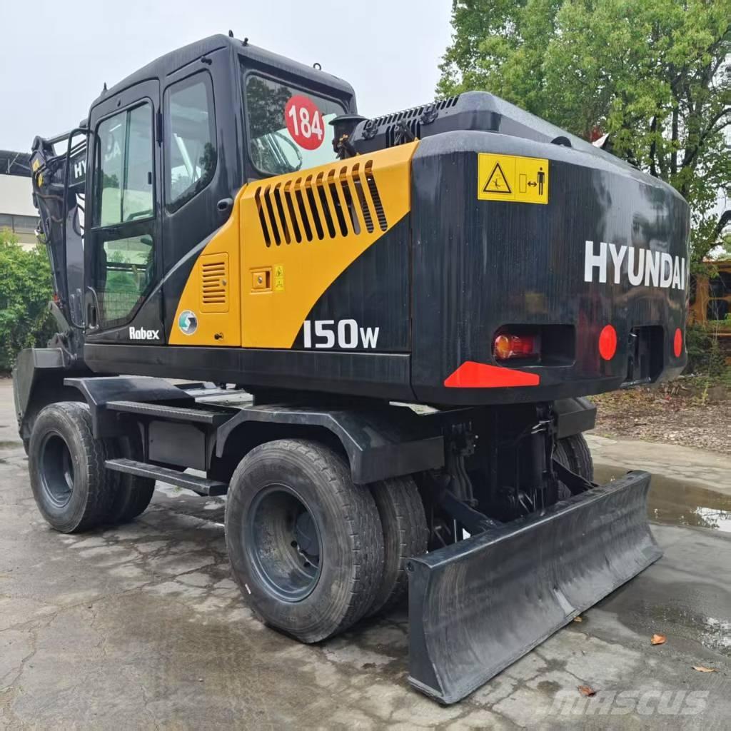 Hyundai R 150 W حفارات بعجل