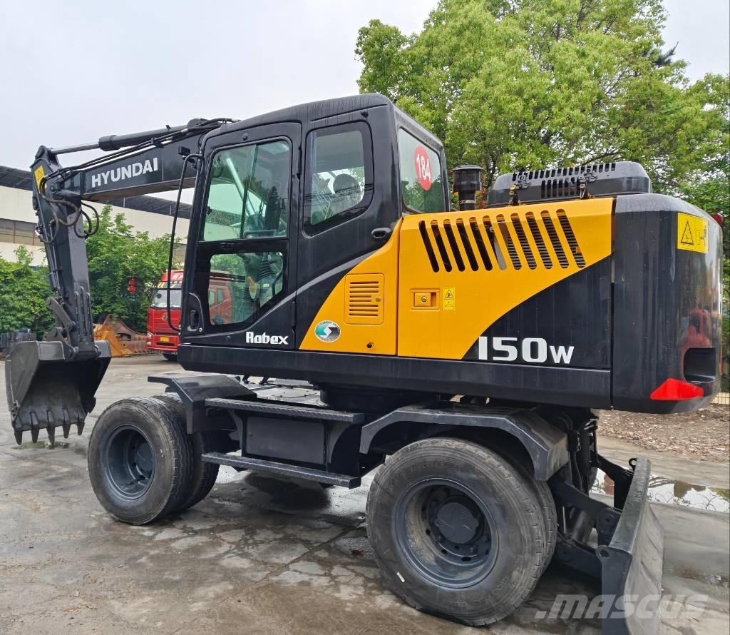 Hyundai R 150 W حفارات بعجل