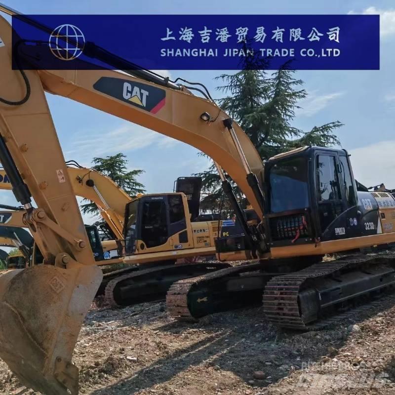 CAT 323 D حفارات زحافة