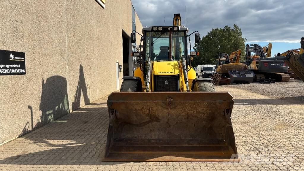 New Holland B 115 C لوادر ذات جرافات عكسية