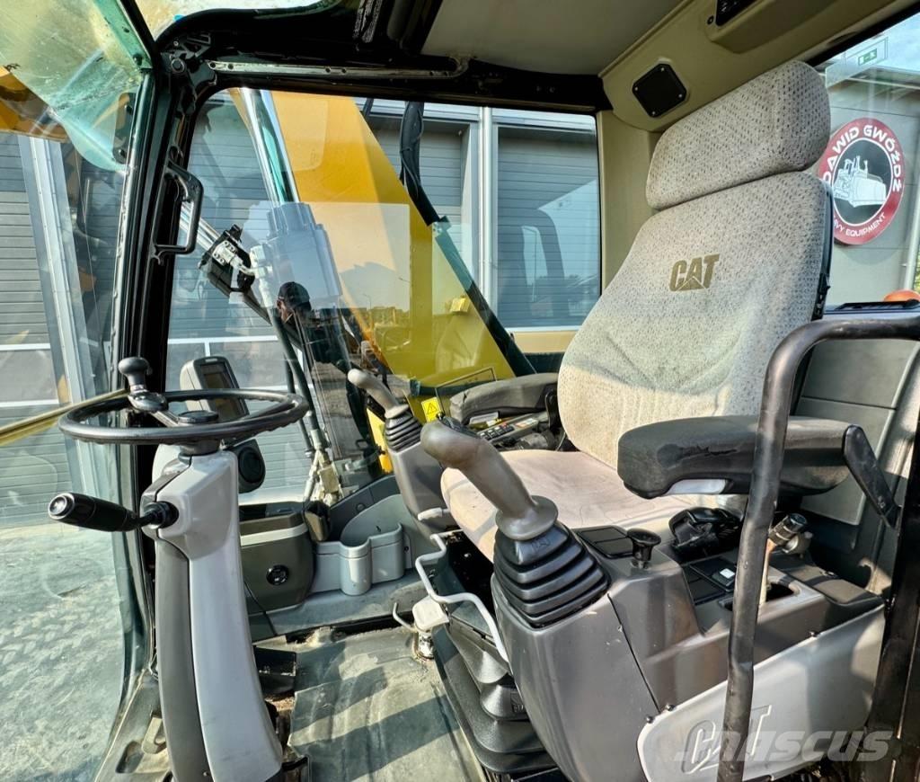 CAT M 316 D حفارات بعجل