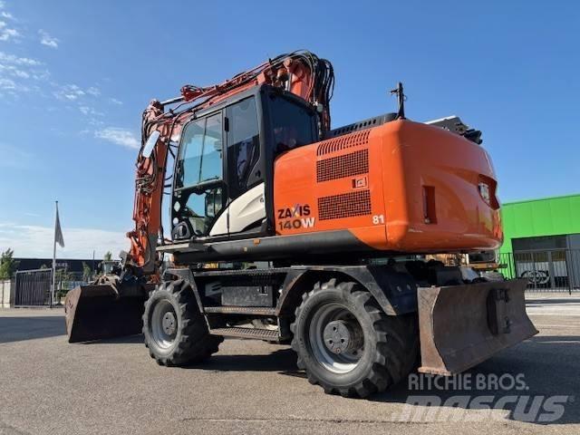 Hitachi ZX 140 W-5 حفارات بعجل