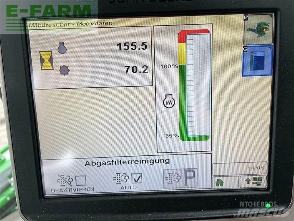 John Deere t560 حصادات