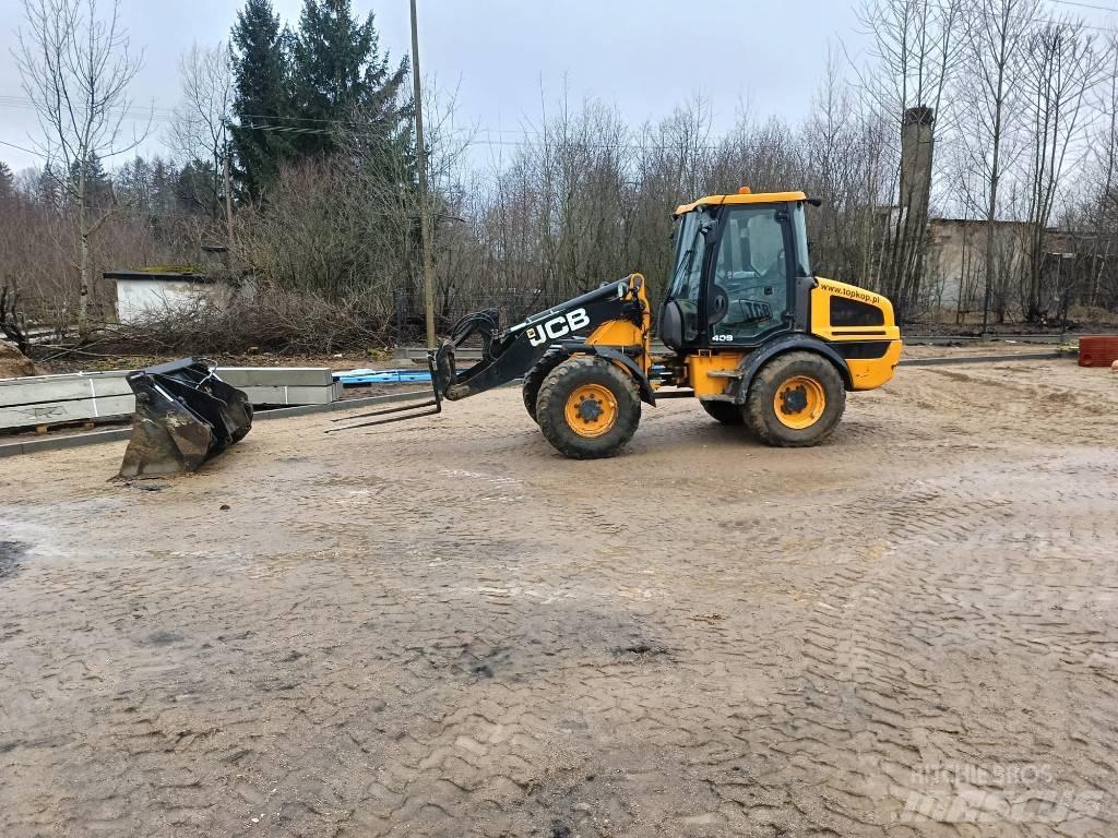 JCB 406 لوادر بعجل