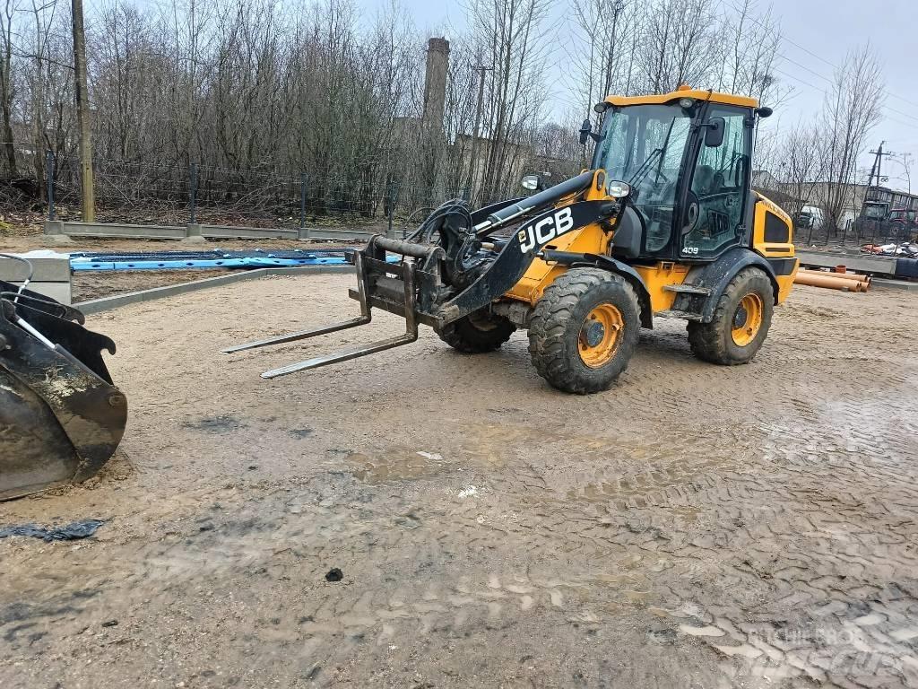 JCB 406 لوادر بعجل