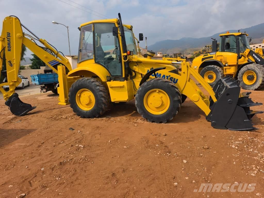 Komatsu WB 97 S-2 لوادر ذات جرافات عكسية
