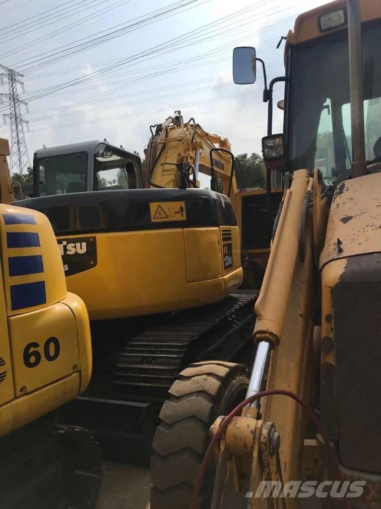 Komatsu PC 128 US حفارات وسط 7 طن - 12 طن