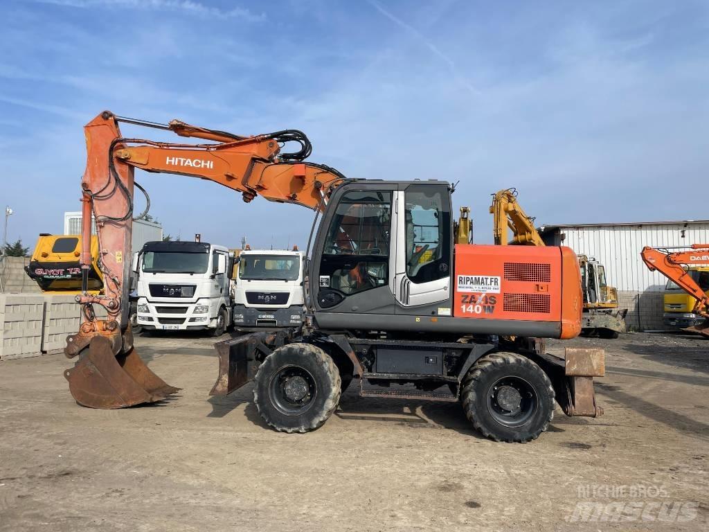 Hitachi Zaxis 140 W حفارات بعجل
